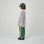 Child wearing JEJEUNOSITY kidswear in a relaxed oversized fit