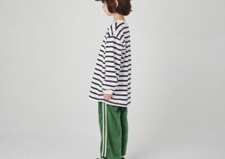 Child wearing JEJEUNOSITY kidswear in a relaxed oversized fit